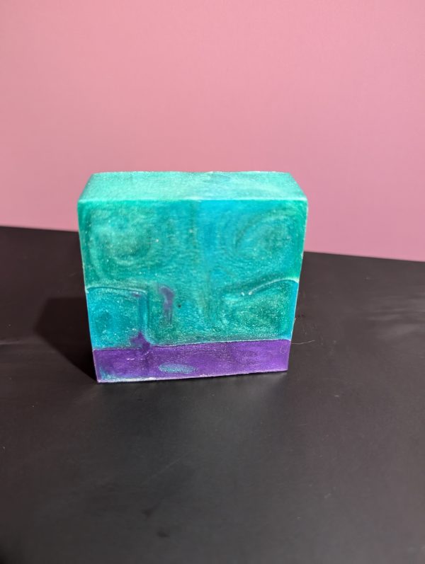 Square soap bar with a mix of Green, Blue (swirled together) and Purple.